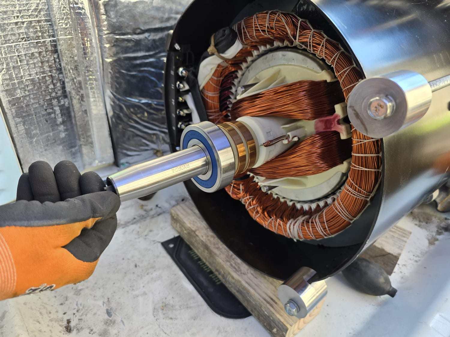 Alternator and stator work in progress on a standby generator